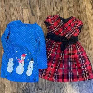 2 winter dresses ! Size 6.  Blue Snowman Dress and Red Plaid Dress Set